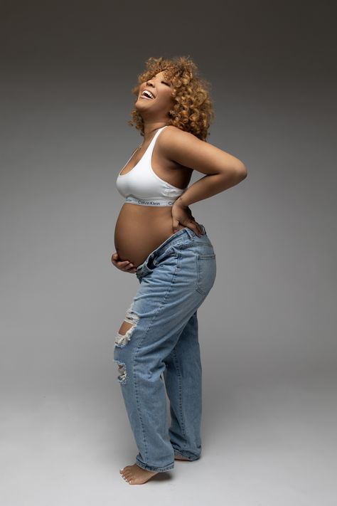 calvin klein maternity shoot, black mom  maternity sesssion, smiling mom maternity Maternity Pics Calvin Klein, Simple Maternity Poses, White Bra And Jeans Maternity Shoot, Simple Maternity Shoot Outfit, Simple Maternity Outfits For Photoshoot, Maternity Photo Shoot Jeans Outfit, Maternity Photo Shoot Ideas Calvin Klein, Calvin Klein Maternity Shoot Family, White Shirt Blue Jeans Maternity Shoot