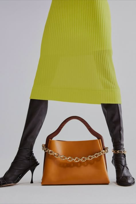 Bottega Veneta Mount bag yellow Ribbed-knit silk midi dress black Dot leather boots Wardrobe 02 collection Mytheresa Editorial Bag Shoot, Bag Editorial Photography, Bag Editorial, Product Editorial, Bag Shoot, 70s Fashion Disco, Shooting Bags, Bag Photography, Fashion Still Life