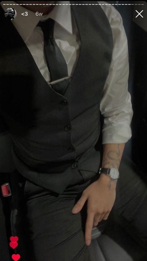 guy dressed in business attire, very classy, fitted suit, suit and tie, black tie, tattoo, has snake tattoo, ceo vibe, wearing watch, wearing classic suit, wearing suit vest, ceo outfit inspo, outfit inspo Tie Tattoo, Ceo Outfit, Outfit With Tie, Tattoo Snake, Black Suit Men, Classy Suits, Aesthetic Outfits Men, Vest Outfit, Hot Tattoos