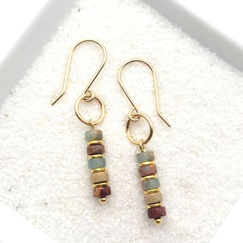 Minimalist style with these 14k gold filled earrings with Aqua Terra jasper beads * Earrings are made from quality 14k gold filled wire, they measure approximately 1.5" in length. * Polished to a high shine * Sent in a Gift Box with Polishing Cloth * Handmade in Montana Earrings Handmade Boho, Bijoux Fil Aluminium, Plastic Pouch, Aqua Terra, Wire Jewelry Designs, Gold Dangle Earrings, Beads Earrings, Earrings Inspiration, Homemade Jewelry