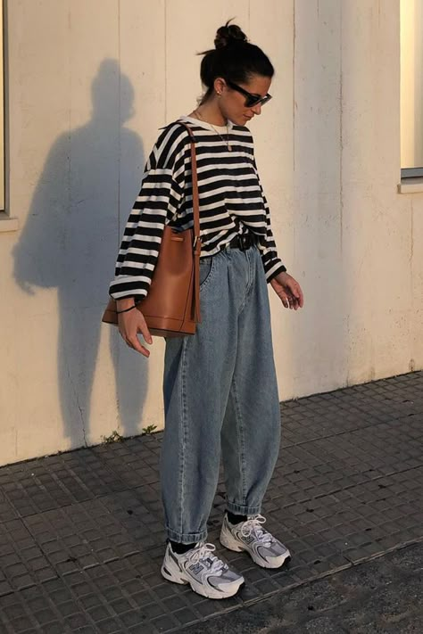 Sneakers Looks Outfit Ideas, Chunky Sneakers Outfit Jeans, Dress And Chunky Sneakers, Slouchy Pants Outfit Winter, Trendy Chunky Sneakers, Outfits For Sneakers, How To Style Slouchy Jeans, Spring Outfits Aesthetic 2025, Women Oversized Shirt Outfit