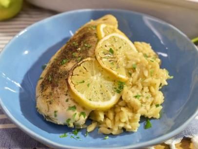 Greek Lemon Chicken and Orzo Casserole Recipe | Jeff Mauro | Food Network Lemon Chicken Casserole, Greek Lemon Orzo, Lemon Chicken And Orzo, Lemon Orzo Chicken, Orzo Casserole, Chicken And Orzo, Seared Salmon Recipes, Jeff Mauro, Lemon Orzo