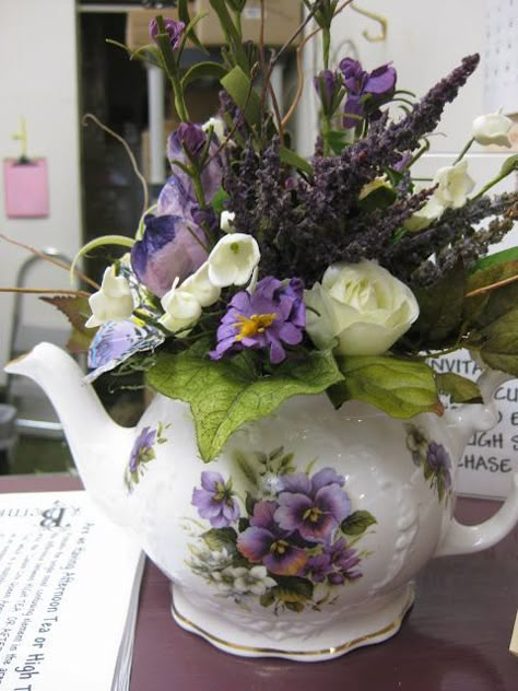 teapot with flowers. Would be a great way to incorporate my teapot collection: Tea Pot Decorating Ideas, Purple Tea Party Decorations, Tea Pot Centerpiece, Teapot With Flowers, Teapot Centerpiece, Teapot Decorations, Tea Party Centerpieces, Teapot Decor, Purple Tea