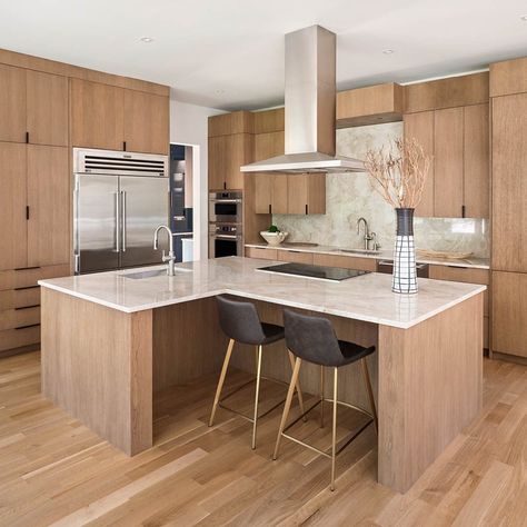 A unique L-shaped island created extra prep and dining space while adding intrigue to the space. Swipe For more views of this stunning… | Instagram T Shaped Kitchen Island, L Shape Kitchen Design, L Shaped Island, Airy Kitchen, City Homes, L Shaped Kitchen, Brown Kitchens, Oak Kitchen, Stunning Kitchens