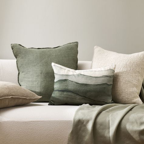 Invite the landscape inside with the evocative hand-painted design of Aurelia. Topographical forms are captured in a serene colour palette that creates a sense of calm and promotes wellbeing. Pair with neutral, sage, and winter moss tones.  #cushion #throwpillow #bedding #interiorstyling #interiordesign #livingroom #homestyling #architecture #australianhomes #handpainted Plain Cushions, Gift Card Design, Outdoor Chair Cushions, Living Room Collections, Outdoor Coffee Tables, Home Decor Vases, Rectangular Rugs, Bedroom Collection, Linen Cushion