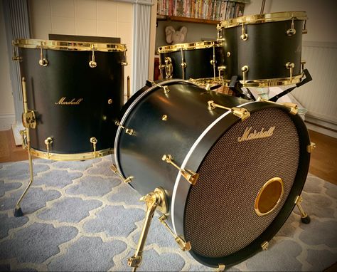 Hand made custom drum kit inspirated by a vintage marshall amp. Faux leather wrap, gold hardware and replica marshall salt & pepper speaker cloth on front bass drum head. Drum Wrap, Marshall Amps, Drum Head, Drum Kit, Bass Drum, Drum Kits, Drum And Bass, Leather Wraps, Salt Pepper