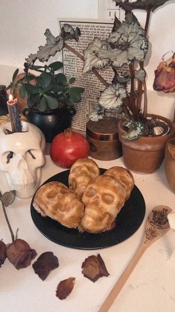 Nikka Phillips ☾ on Instagram: "Some pomegranate and raspberry puff pastry skulls we made on Samhain for Persephone 🖤 thank you, @turnipvegan for the recipe! They came out better than expected 🥹🥀   Ingredients: • 1 cup pomegranate • 1/2 cup organic sugar • 1 cup of raspberries • 1/4 tsp cinnamon • 1/4 tsp cardamon (I used nutmeg)  • 1/2 cup pomegranate juice or water • 1 Tbsp tapioca starch • 1/4 cup of cream cheese • 1 puff pastry roll   Method:  1. Cut and remove pomegranate seeds.   2. Add pomegranate, raspberries, organic sugar, cinnamon, cardamom, and pomegranate juice to a saucepan and cook for 12-14 minutes on medium heat. 3. Add cream cheese and starch and stir. Cook for 1-2 minutes.  4. Oil pan. Fill puff pastry and bake for 12-18 minutes at 400 degrees  . . . . #naturalwitch # Puff Pastry Filling, Organic Sugar, Pomegranate Juice, Pomegranate Seeds, Samhain, Oil Pan, Puff Pastry, Pomegranate, Nom Nom