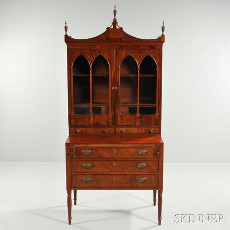 Mahogany and Mahogany Veneer Desk/Bookcase, probably Massachusetts, c. 1810, with shaped gallery above two Gothic glazed doors opening to a shelved interior with two drawers and two cockbeaded exterior drawers on the case with fold-out writing surface, cockbeaded drawers, all on ring-turned, reeded, swelled legs, replaced brasses, refinished, (imperfections), ht. 81 1/4, wd. 35 3/4, dp. 21 1/2 in. Federal Furniture, Dream Studies, Mahogany Bookcase, Bookcases For Sale, Glazed Doors, Swollen Legs, Period Furniture, Glazed Door, Stately Home