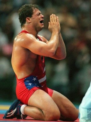 Kurt Angle of the United States reacts to his gold medal win in the 100kg class of freestyle wrestling at the Centennial Olympic Games in Atlanta. 1996 Olympics, Olympic Wrestling, Kurt Angle, Wrestling Team, Atlanta Olympics, American Athletes, Wrestling Stars, Olympic Gold Medals, Wwe Legends