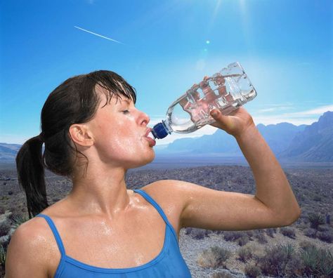 “Heavy sweating is a sign that your body is producing a lot of heat,” says Bergeron, which could lea... - Getty Images Exhaustion Symptoms, Stop Sweating, Signs Of Dehydration, Heavy Sweating, Heat Exhaustion, Health Administration, Killer Workouts, Homemade Facials, Water Bodies