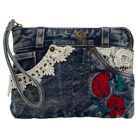 Patricia Nash Cassini Lace and Embroidered Denim Wristlet   This compact accessory featuring beautifully embroidered flowers and lace is a sleek companion for any ensemble and just the right size to carry essentials without weighing you down. Use the handy wrist strap when you don't need a larger bag. Just grab the Cassini and go. Purse Inspiration, Denim Wristlet, Handbag Sewing, Denim Wallet, Quilted Clothing, Purse Ideas, Jean Purses, Bags Sewing, Making Bags