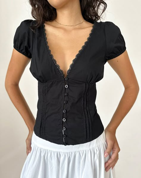 The Ilias top in black poplin fabric. Features a deep v neckline with picot trim, button down front, short capped sleeves and a corset style body. Black Sweetheart Neckline Top, Gilmore Outfits, Greece Summer, Sew Projects, Cap Sleeves Blouse, Party Dress Long Sleeve, Clothing Wishlist, Bandeau Dress, Capped Sleeves