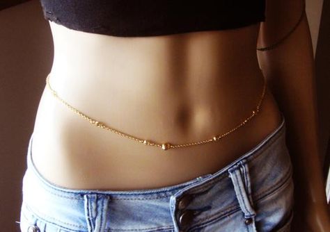 This is gorgeous belly chain with combination of 24 k gold plated chain and gold plated beads and gold crystal connectors. This high quality gold plated chain is tarnish resistant is all handmade and unique. Enjoy the summer with this beautiful body jewelry. You can wear it with your bikinis or over Gold Waist Chain Indian, Gold Handmade Waist Chain For Gift, Bollywood Gold Waist Chain For Weddings, Adjustable Handmade Gold Waist Chain, Gold Waist Chain For Festival, Waist Chain Indian, Gold Bollywood Waist Chain For Festivals, Waist Jewelry, Belly Button Piercing Jewelry