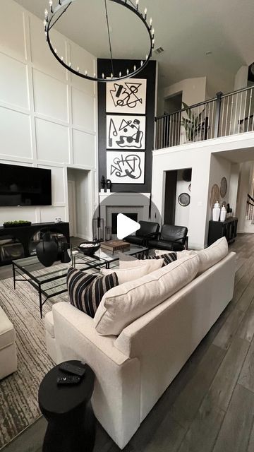 Kimberly  Cherie Moore on Instagram: "Dealing with high ceilings can sometimes be overwhelming as you figure out what to add to the space. However, incorporating millwork can be a great way to address this. Also, when thinking about purchasing art for your walls, it’s important to choose pieces that fit the scale of your space for a cohesive look." Tv On Wall With High Ceiling, 2 Story Living Room Tv Wall Ideas, Tv Wall With High Ceilings, Tv Wall High Ceiling, High Ceiling Tv Wall Ideas, High Ceiling Living Room Ideas, 2 Story Living Room, Living Room With High Ceilings, Round House Plans