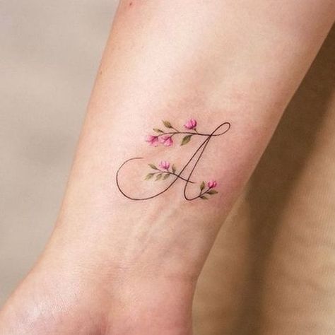 19 Creative Letter A Tattoo Designs 2024: From Minimalist to Monograms - Find Your Style Letter A Tattoo Designs, A Tattoo Designs, A Letter Tattoo, Letter A Tattoo, Hand Tattoo Images, Butterfly Tattoos Images, Delicate Tattoos For Women, Carnation Tattoo, Monogram Tattoo