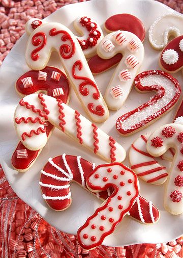 Candy Cane Sugar Cookies     Festive and pretty, these buttery Christmas cookies make perfect treats Christmas Cookie Decorating, Cut Out Cookie Recipe, Candy Cane Cookies, Christmas Cookie Exchange, Best Christmas Cookies, Holiday Goodies, Cookie Decorating Ideas, Decorating Cookies, Christmas Foods