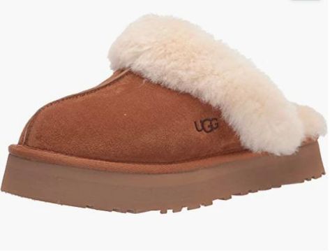 Shearling Dyed Sheep Fur (Fur Origin: Australia/United Kingdom/Ireland/United States/Spain) Synthetic Rubber sole Suede upper Sheepskin collar 10mm sheepskin lining and insole EVA outsole 1" platform height Ugg Slippers Women, Ugg Store, Disco Style, Classic Slippers, Flowy Midi Dress, Outfit Chic, Ugg Slippers, Classic Boots, Slipper Shoes