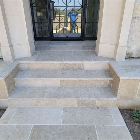 Front Garden Steps Ideas, Tile Front Porch Entrance Modern, Stone Tile Porch, Travertine Porch Floor, Tiled Front Door Step Entrance, Tiled Porch Steps, Patio With Steps Down From House To Pool, Pavers Entryway Entrance, Travertine Front Entrance