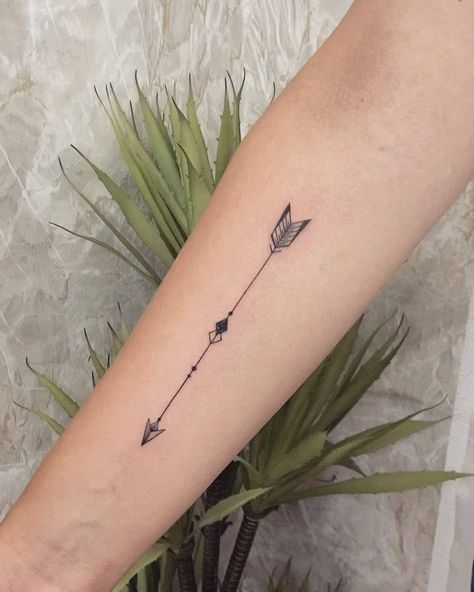 Fine line arrow tattoo on the inner forearm. Dog Arrow Tattoo, Arrow Tattoo Forearm Woman, Arrow On Finger Tattoo, Arrow Tattoo Arm Women, Strength Arrow Tattoo For Women, Arm Arrow Tattoos For Women Forearm, Sun Arrow Tattoo, Fine Line Arrow Tattoo Design, Fine Line Arrow Tattoos For Women