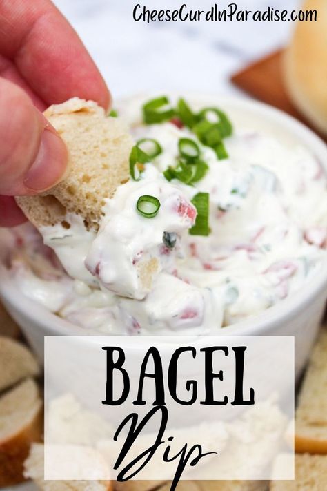 Dip in a white container. Hand holding a bagel is dipping into the dip. Green onions are on top of the dip. Dill Bagel Dip, Bagel Dip Recipe Corn Beef, Bagel Dip Dried Beef, Bagel Dip Recipe, Easy Bagel, Bagel Dip, Cheese Curd, Beef Dip, Dried Beef