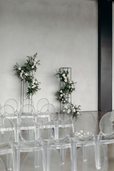 Minimalist Ceremony, Helicopter Hangar, Floral Columns, Hangar Wedding, Modern Black And White Wedding, Monochromatic Wedding, White Floral Arrangements, Minimalist Wedding Decor, Modern Minimalist Wedding