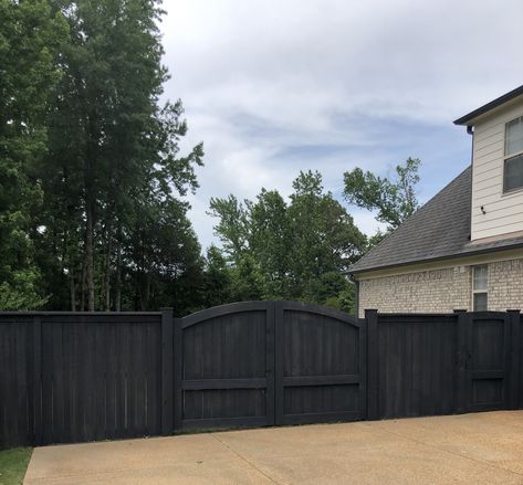 We used Valspar Charred Gray Semi-Transparent Stain.  This is the first coat.  Love!  it matches the SW Peppercorn 7674 paint we have on our exterior. Valspar Darkest Night Stain, Dark Gray Fence, Fence Stain Colors, Sw Peppercorn, Gray Fence, Grey Fences, Fence Backyard, Diy Backyard Fence, Beach Property