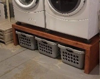 Raise Your Laundry Game With A Custom Pedestal FREE SHIPPING | Etsy Washer And Dryer Stand, Laundry Stand, Laundry Room Pedestal, Washer And Dryer Pedestal, Laundry Basket Holder, Laundry Room Appliances, Basket Holder, Laundry Basket Storage, Pantry Laundry