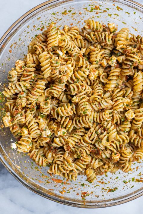 Sun-Dried Tomato Pasta with Kale and Feta is easy to prepare, full of flavor and can be enjoyed as a filling dinner or a chilled pasta salad side dish!  You only need a handful of ingredients to make this delicious vegetarian pasta recipe.  Sun-dried tomatoes pack a big flavor punch, the kale adds extra veggies and feta cheese is a must!  #pastasalad #easydinnerrecipe #vegetarian #sundriedtomatopasta Pasta Salad Sun Dried Tomatoes, Salad Sun Dried Tomatoes, Vegetarian Pasta Recipe, Pasta With Kale, Sun Dried Tomato Pasta, Feta Pasta Salad, Tomato Pasta Salad, Avocado Pesto Pasta, Sundried Tomato Pasta