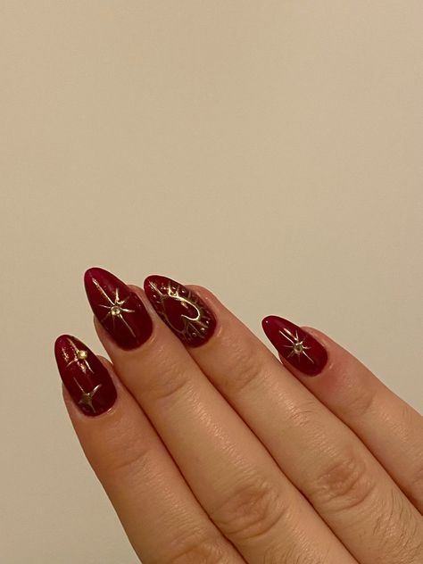 #BEAUTY, #RELATIONSHIPS #Fashion #Animals #Outfits #Winter Outfits #Animals Dark Red Nails Gold Accent, Cherry Burgundy Nails, Red Cherry Nail Art, Red Nails With Gold Stars, Dark Cherry Red Nail Designs, Pomegranate Nail Art, Cherry Red Nails Design, Red Gold Nails Design, Christmas Nails With Gems