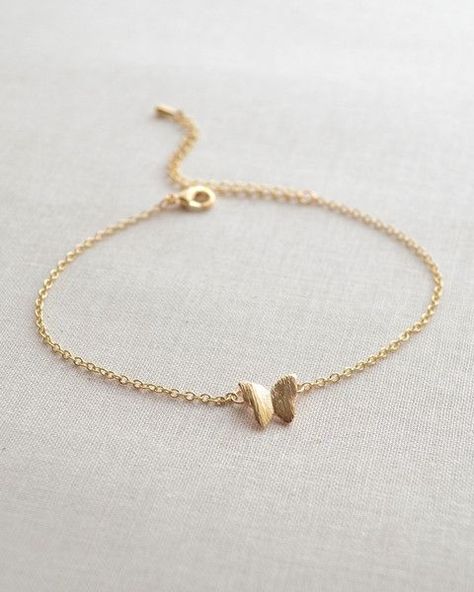 Butterfly Bracelet by Olive Yew. This butterfly bracelet is so dainty and feminine. It is adjustable from 7 - 9 inches, so it will fit any size wrist. Grunge Necklace, Butterfly Bracelet, Fancy Jewellery, Gold Earrings Designs, Dainty Bracelets, Fancy Jewelry, Hand Jewelry, Girly Jewelry, Stylish Jewelry