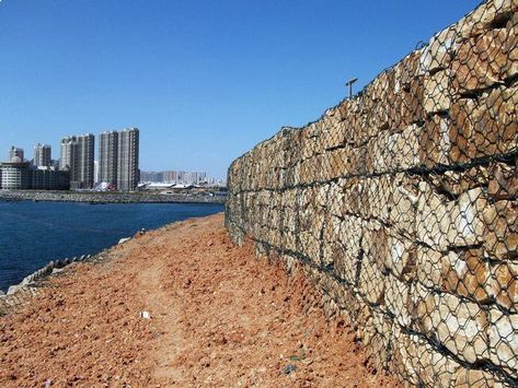 Gabion box has two types, woven gabion and welded gabion. Woven gabion is made from hexagonal wire netting and welded gabion is made from the welded wire mesh sheet, which are widely used in slope protection, foundation pit supporting, mountain rock holding, river and dams scour protection. Gabion Box, Gabion Stone, Wire Netting, Gabion Wall, Mesh Fencing, Erosion Control, Masonry Wall, Galvanized Iron, Water Table