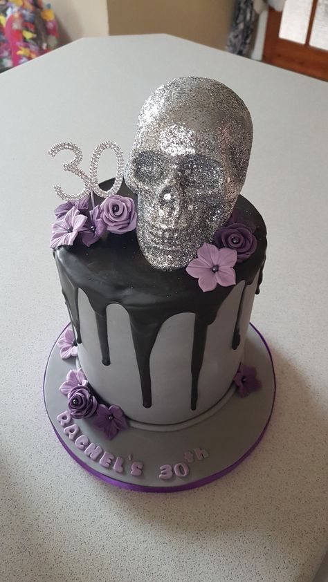 My amazing 30th Birthday cake. Thanks, Sam's Cakes! (https://www.facebook.com/samvanilladreamscakes/) #dripcake #black #grey #purple #skull #floral #gothic #glitter #30thbirthday Skull Themed Birthday Party, Skull Birthday Party Ideas, 30th Birthday Ideas For Women Cake, Halloween 40th Birthday Cakes, Dirty 30 Birthday Cake For Women, Dirty 30 Cakes For Women, Halloween Birthday Cakes For Women, Black And Purple 30th Birthday, Dirty Thirty Cakes For Women