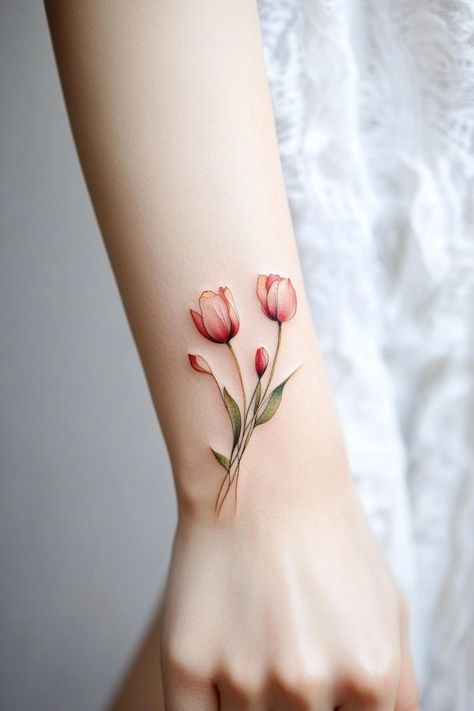 Delicate tattoo of two blooming tulips with buds on an arm. Small Female Tattoos, Female Tattoo Designs, Small Anchor Tattoos, Small Bee Tattoo, Tiny Designs, Small Cross Tattoo, Small Tattoos For Women, Tulip Tattoo, Powerful Symbols