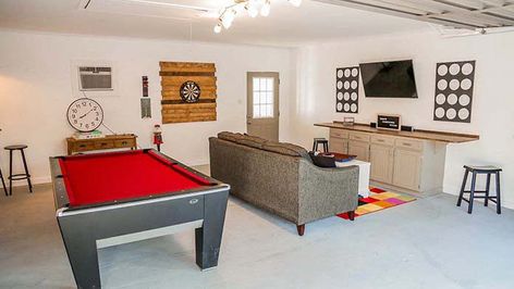 Repurposing a Garage into a Fun Teen Hangout - Today's Homeowner Garage Teenage Hangout, Garage Gym Man Cave, Garage Renovation Living Spaces, Garage Hangout Ideas Diy, Garage Hang Out Space, Garage Hangout Ideas, Garage Conversion To Family Room, Garage Hangout, Teen Hangout Room