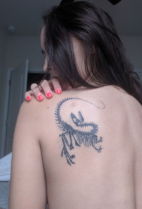 Dinosaur Tattoo Raptor, Archaeology Inspired Tattoos, Dinosaur Tattoo Aesthetic, Aesthetic Dinosaur Tattoo, Velociraptor Claw Tattoo, Zoology Tattoo Ideas, Velociraptor Skeleton Tattoo, Dinosaur Back Tattoo, Tiktaalik Tattoo