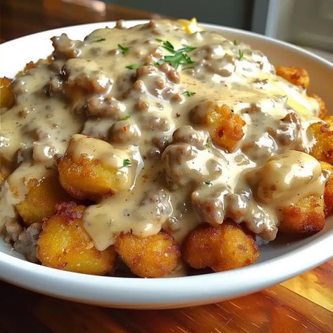 Tater Tot Breakfast Bowl with Sausage Gravy - Tater Tot Breakfast Ideas, Tater Tot Sausage Gravy Breakfast Casserole, Tater Tot Sausage Gravy Casserole, Tater Tot Breakfast Bowl With Sausage Gravy, Sausage Gravy Tater Tot Casserole, Comfort Breakfast Food, Tater Tot Breakfast Bowl, Breakfast Sausage Ideas, Camping Food Breakfast