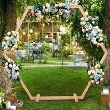 https://encrypted-tbn0.gstatic.com/images?q=tbn:ANd9GcTgESj6JnV4GnJDoDDXCkzaOT95es-sLlSfgg&usqp=CAU Country Wedding Arches, Hexagon Wedding Arch, Party Backdrop Stand, Ceremony Archway, Wood Wedding Arches, Archway Decor, Wooden Wedding Arches, Outdoor Wedding Flowers, Backdrop Arch