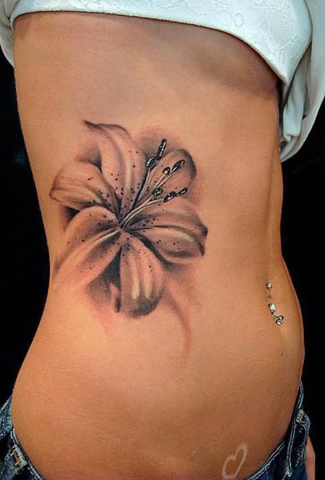 Single lily flower. I'd have it smaller, near my hip bone. 3d Flower Tattoos, Tattoo Lily, Girl Rib Tattoos, Tiger Lily Tattoos, Realistic Flower Tattoo, Flower Tattoo On Side, Lily Flower Tattoos, Hibiscus Tattoo, Beautiful Flower Tattoos