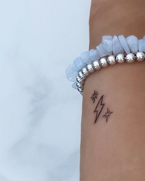 Dainty Lightning Bolt Tattoo, Lightning Tattoo Meaning, Lightning Bolt Meaning, Lightening Tattoos Women, Lighting Bolts Tattoos, Lightnight Bolt Tattoo, Lightning In A Bottle Tattoo, All Lights Turned Off Tattoo, Lightning Bolt Tattoo Meaning