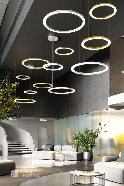 The luminaire is dedicated to rooms with large cubic capacity. It will emphasise the prestige of hotel spaces, reception areas, modern shopping malls, large conference rooms and other spacious representative rooms.. #interiordesign #designinterior #architecturedesign #designinspiration #designlovers #interiordesign #interiorlovers #interiorstyling #contemporarydesign #officelamp #light #ledlight #interior #swiatlo #architecture #contemporary #lighting #solanto #lenalighting #seemore Modern Reception Area Interior Design, Office Ceiling Lights, Reception Room Design, Modern Office Lighting, Reception Ceiling, Reception Lighting, Commercial Lighting Fixtures, Lobby Lighting, Lobby Ideas