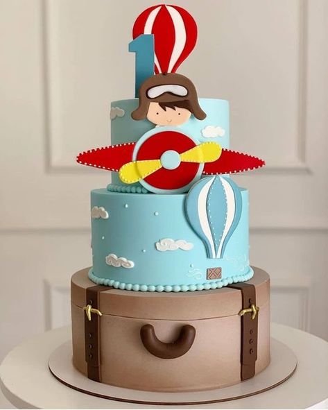 Time flies-inspired three tier birthday cake Airplane Hot Air Balloon Cake, Airplane First Birthday Cake, Aeroplane Birthday Party Ideas, Plane Cakes For Boys, Aeroplane Theme Cake, Aeroplane Theme Birthday Party, First Birthday Airplane Theme, Airplane Cakes For Boys, Plane Birthday Party Ideas