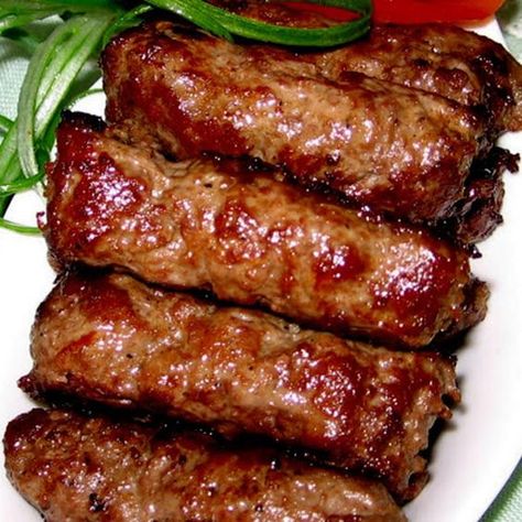 Mititei (Spicy, Garlicky Grilled Sausages) recipe on Food52 Mititei Recipe, Yugoslavian Recipes, Farmstand Recipes, Longganisa Recipe, Europe Kitchen, Romanian Dishes, Sausages Recipe, Romanian Culture, Sausage Making Recipes