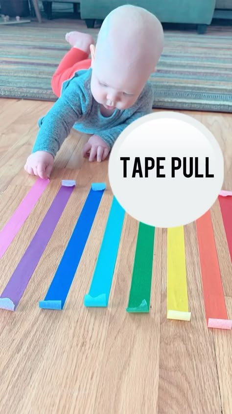 ✨FLASHBACK FRIDAY✨ 🌈TAPE PULL🌈 This one was so much FUN! As soon as Karmella saw the tape on the floor she couldn’t get over to it fast enough. This kept her busy for about 15-20mins. This is also a great activity for little ones during tummy time to encouraging movement. To make it more challenging for older kids you can criss cross the tape over each other so it becomes a puzzle of which tape to peel first. You can also set up on the floor, on a wall, or on a table. *Always supervise wh My Body Activities For Infants, Infant Fine Motor Activities Daycare, Infant Invitation To Play, Infant Tummy Time Activities, Low Stimulation Activities, Pincer Grasp Activities For Babies, Sensory Activities For Babies 6 Months, Velcro Activities For Toddlers, Tape Activities For Toddlers