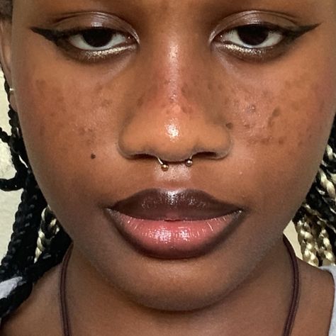 Black girl septum, black girl grunge makeup, grunge makeup, hippy makeup, black girl grunge, black girl hippy, ethereal black girl Septum Piercing On Wide Nose, Gold Septum Black Woman, Piercings On Big Noses, Black Septum Piercing Aesthetic, Septum On Big Nose, Gold Septum Piercing On Black Women, Septum Piercing On Big Nose, Septum Black Women, Septum Piercing Big Nose