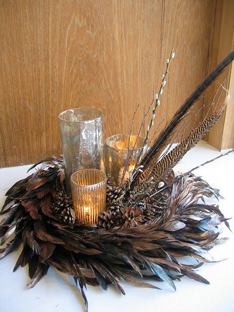 This is a gorgeous way to rock the neutral colored feathers. Follow more of this trend at http://www.arizonaweddings.com/ Decorating With Turkey Feathers, Turkey Feather Centerpiece, Feather Project Ideas, Turkey Feather Crafts, Feather Art Diy, Turkey Feather Decor, Pheasant Decor, Pheasant Feather Decor, Feather Ideas