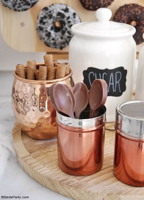 How to Style a Coffee and Donuts Bar for a Party - easy, quick and inexpensive DIY craft projects and ideas to set up a drinks station for entertaining: DIY Rae Dunn inspired mugs, coffee and sugar canisters, custom coffee syrup bottles and a donuts wall! by BirdsParty.com @birdsparty #coffeebar #coffeestation #diycoffeebar #coffeedonutspartyideas #partyideas #winterparty #babyshower #bridalshower #donutsparty #donutswall #diydonutswall #diydonutsboard #donutsbirthday #raedunn #diy #crafts Coffee Cup Party Favors, Coffee House Theme Party, Coffee Party Ideas Decoration, Donut And Coffee Bar, Iced Coffee Bar Ideas Party, Coffee Bar Party Ideas, Coffee Party Decorations, Coffee Party Ideas, Coffee Bar Ideas For Party