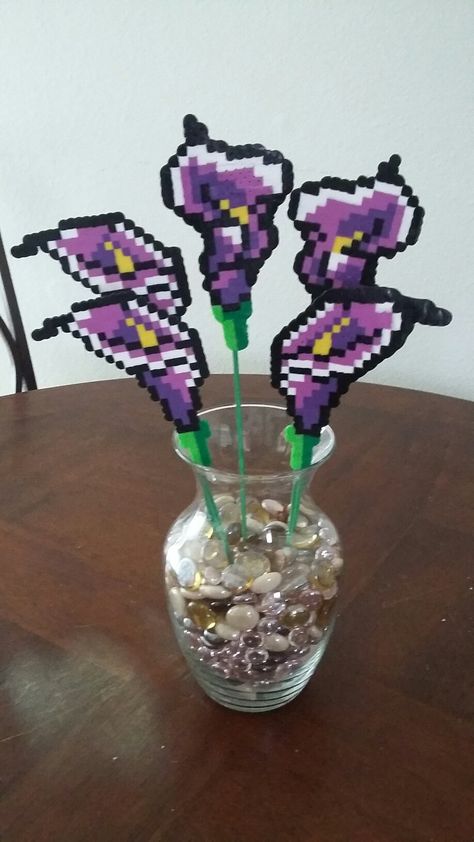 Flowers I made my mom for mother's day out of perler beads. Wedding Perler Beads, Perler Bead Mothers Day Ideas, Mom Perler Beads, Mothers Day Hama Beads, Mothers Day Perler Beads, Perler Flower, Flower Perler Beads, Perler Bead Flowers, Perler Bead Mother’s Day