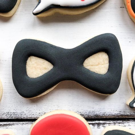 Incredibles, Incredibles catching the bad guys! ❤️🧡🖤 Who can guess what cookie cutter we shifted to make this mask? Comment below! . . .… Disney Villian Cookies, Jack Jack Incredibles Cake, The Incredibles Cookies, Bad Guy, Mask, Lily, The Incredibles, Canning