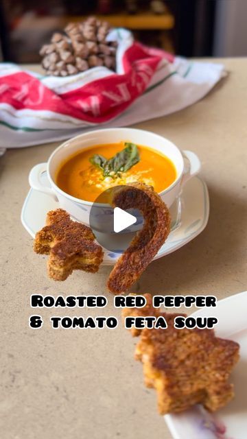 Ayushi Gupta-Mehra on Instagram: "The baked feta trend is back , except this time we’re making …. ROASTED RED PEPPER & TOMATO FETA SOUP! It’s so creamy yet there’s no cream involved at all! The baked feta adds a caramelised creaminess to this cosy soup. Festive cheese toasties are optional but highly recommended for the perfect holiday season pairing ! Pre-heat your oven to 185C. Line a baking tray with parchment paper and add: - 1 bell pepper, sliced - 4 tomatoes, sliced - 1 carrot, diced - An onion, quartered Drizzle liberally with olive oil, sea salt, black pepper and your seasonings of choice.. Toss well to ensure everything is well-coated. Now find a cosy spot for half a head of garlic and half/ full block of feta in the centre of the tray. Drizzle with more olive oil. Pop the Tomato Feta Soup, Ayushi Gupta, Feta Soup, Cheese Toasties, Baked Feta, Garlic Head, Roasted Red Pepper, Baking Tray, Roasted Red Peppers