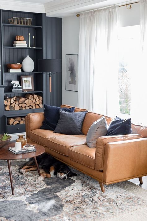 Living Room Designs Cognac Couch, Home Office Leather Couch, Family Room Leather Sofa, Sitting Room Ideas Leather Couch, Mid Century Modern Living Room Leather Couch, West Elm Interior Design, Leather Couch Blue Walls, Office West Elm, How To Style A Sitting Room